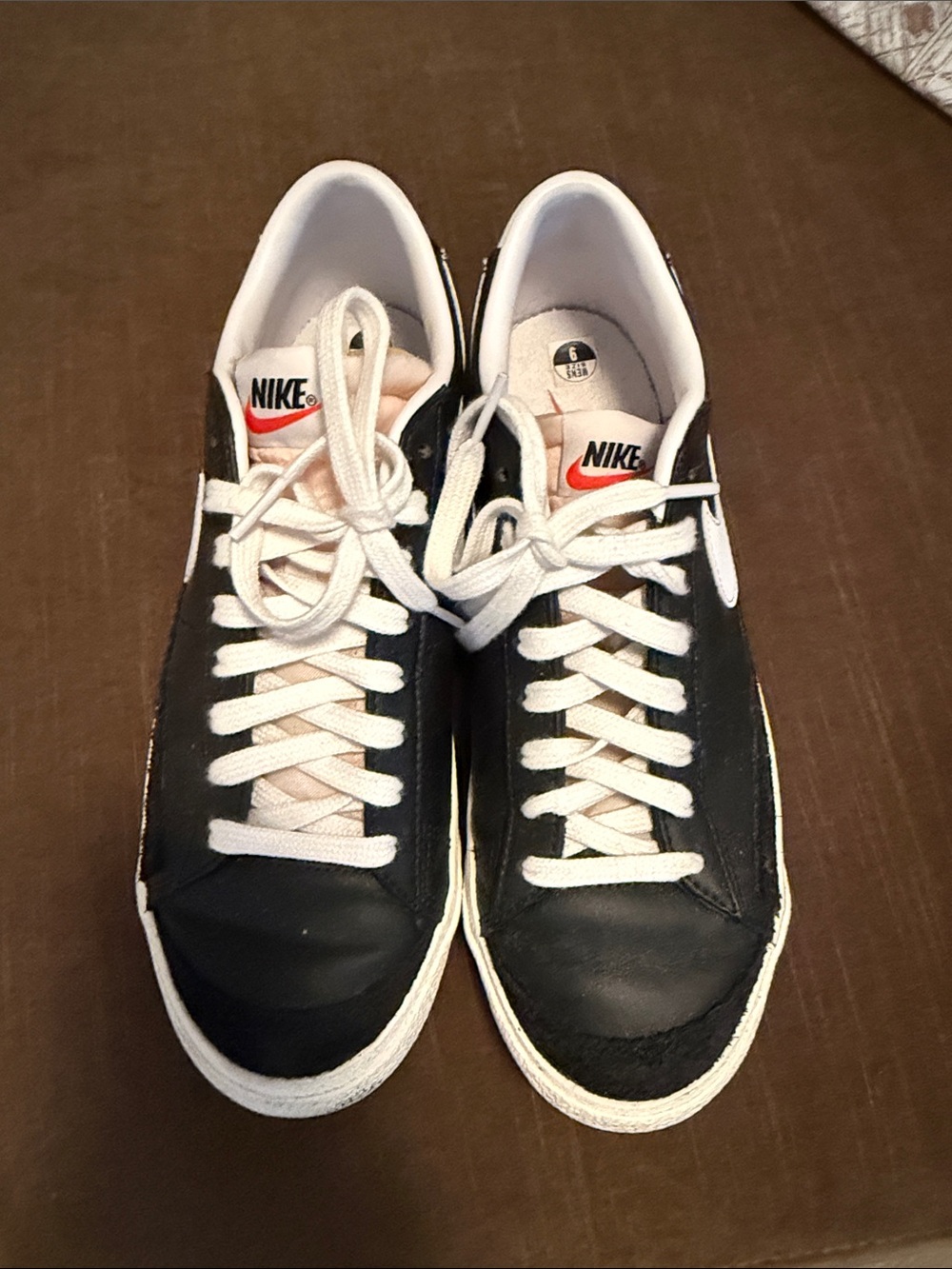 Nike Men’s Black and White Low-Top Sneakers with Red Logo